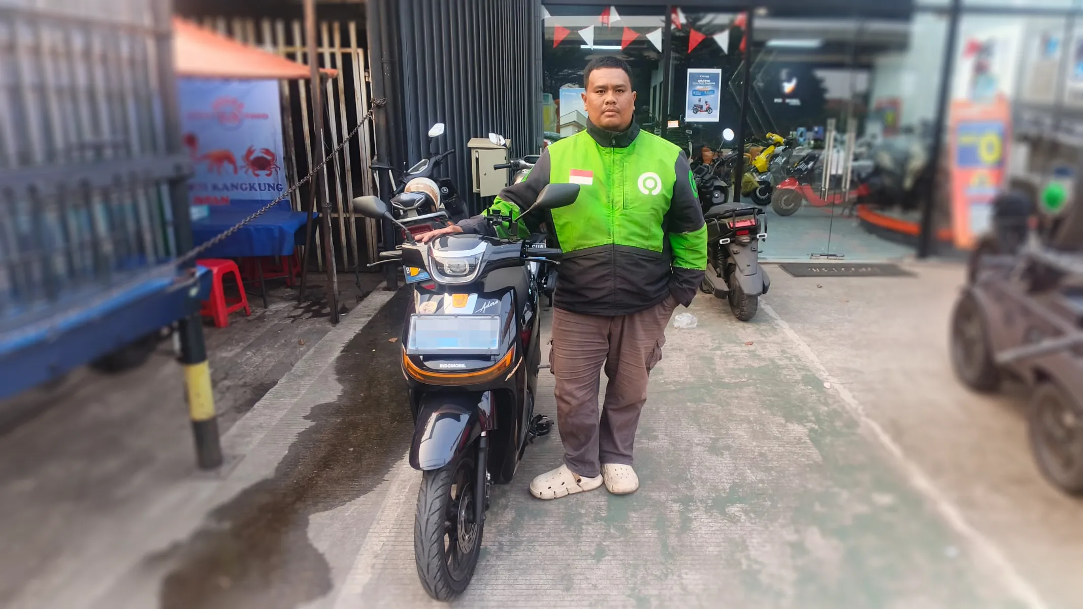 Waktu Charging Jadi Kendala Ojol Pakai Motor Listrik? Ini Solusinya!